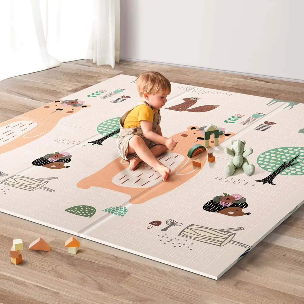 UANLAUO bear and squirrel play mat on a floor