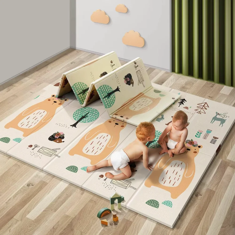 UANLAUO bear and squirrel play mat on a floor